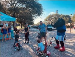 The University mascot Peruna interacting with community members at the 2021 National Night Out.