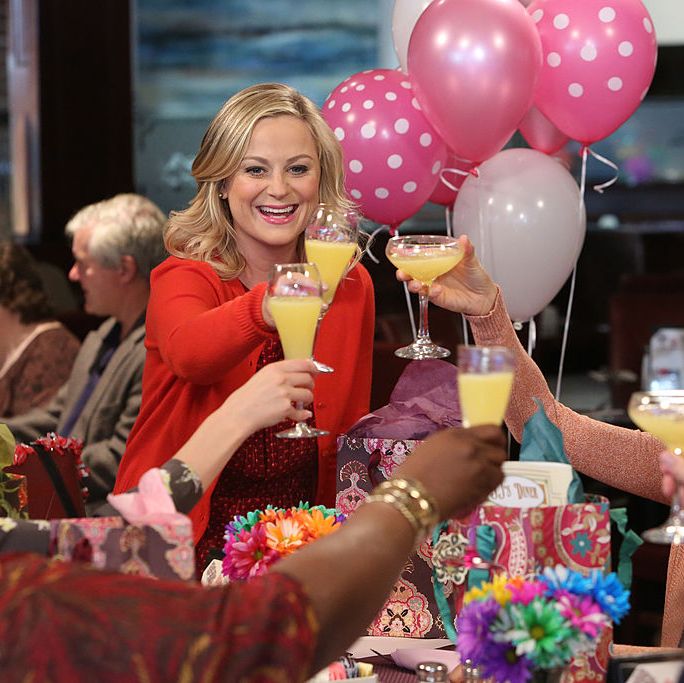 Galentine's Day, famous people cheering with mimosas 